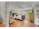 Spacious bedroom featuring hardwood floors, ceiling fan and natural light at 8704 Middleton Point Ln, Edisto Island, SC 29438