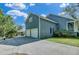 Spacious two-car garage with driveway and additional storage space at 8704 Middleton Point Ln, Edisto Island, SC 29438