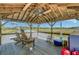 Picturesque gazebo on the water, perfect for relaxing and enjoying waterfront scenery at 8704 Middleton Point Ln, Edisto Island, SC 29438