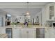 Elegant kitchen with a view to the Gathering room for seamless living at 8704 Middleton Point Ln, Edisto Island, SC 29438