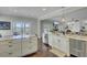 Bright, open kitchen leads into the living area with great natural light at 8704 Middleton Point Ln, Edisto Island, SC 29438