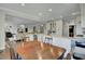 Open concept kitchen flows into the living room, perfect for entertaining at 8704 Middleton Point Ln, Edisto Island, SC 29438