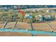Aerial view of a beautiful home with private dock access to the serene waterfront at 944 Hammocks Way, Edisto Island, SC 29438