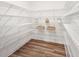 Walk-in pantry offers ample shelving and storage space, great for keeping your kitchen organized at 1008 Tulip Shell St, Summerville, SC 29485