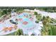Aerial view of the community pool showcasing lounge chairs, umbrellas and cabanas at 1008 Tulip Shell St, Summerville, SC 29485