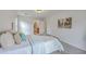 Well-lit bedroom showcasing neutral decor and access to en-suite bathroom at 103 Laurens Ct, Summerville, SC 29485