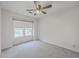 Bright bedroom featuring a ceiling fan, plush carpet, and window with natural light at 103 Laurens Ct, Summerville, SC 29485