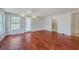 Spacious bedroom features hardwood floors, many windows, and neutral paint at 103 Laurens Ct, Summerville, SC 29485