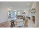 Spacious living room with white fireplace, lots of natural light, and view into office area at 103 Laurens Ct, Summerville, SC 29485