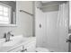 Bright bathroom featuring a shower, toilet, and sink at 103 Sprucewood Dr, Summerville, SC 29485