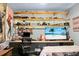 This is a bedroom with shelving units and a television on the study desk at 103 Sprucewood Dr, Summerville, SC 29485