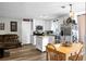 Bright kitchen features stainless steel appliances, white cabinetry, and a butcher block island at 103 Sprucewood Dr, Summerville, SC 29485