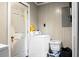 Laundry room with white washing machine and a light-colored panel wall at 103 Sprucewood Dr, Summerville, SC 29485
