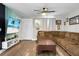 Comfortable living area featuring a large sofa, modern television, and stylish decor at 103 Sprucewood Dr, Summerville, SC 29485