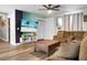 Inviting living room with a comfortable sofa, modern television and stylish decor at 103 Sprucewood Dr, Summerville, SC 29485