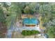Birds eye view of house with driveway, lawn, and greenery at 104 Gervais St, Walterboro, SC 29488