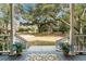 Covered front porch and landscaped backyard at 104 Gervais St, Walterboro, SC 29488