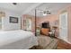 Bright bedroom with ceiling fan, four-poster bed and large area rug at 104 Gervais St, Walterboro, SC 29488