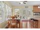 Bright breakfast nook with views of the yard, dining table and open floor plan at 104 Gervais St, Walterboro, SC 29488