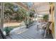 Inviting covered porch with comfortable seating and views of the landscaped yard at 104 Gervais St, Walterboro, SC 29488