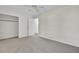 Spacious bedroom with neutral carpet and an open door at 107 Four Iron Dr, Summerville, SC 29483