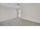Spacious bedroom with neutral carpet and a window with blinds at 107 Four Iron Dr, Summerville, SC 29483