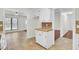 Bright eat-in kitchen with beige tile floor and cabinets with contrasting countertops at 107 Four Iron Dr, Summerville, SC 29483