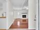 Bright living room featuring hardwood floors, a white brick fireplace, and exposed beams at 107 Four Iron Dr, Summerville, SC 29483