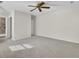 Spacious main bedroom featuring a ceiling fan, neutral walls, and carpet flooring at 107 Four Iron Dr, Summerville, SC 29483