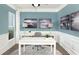 Bright office with a large window, white trim, blue walls, and coordinated decor at 118 Royal Cainhoy Way, Huger, SC 29450