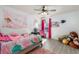 Whimsical bedroom featuring playful decor, natural light, and a cozy bed at 126 Lakelyn Rd, Moncks Corner, SC 29461