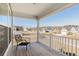 Inviting front porch with a comfortable chair perfect for enjoying neighborhood views at 126 Lakelyn Rd, Moncks Corner, SC 29461