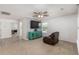 Relaxing living room with stylish decor, a comfortable recliner and a modern entertainment center at 126 Lakelyn Rd, Moncks Corner, SC 29461