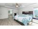 Comfortable main bedroom features a tray ceiling, large windows and an en-suite bathroom at 126 Lakelyn Rd, Moncks Corner, SC 29461