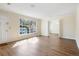 Spacious living room with hardwood floors and a large window, showcasing lots of natural light at 1308 Coleridge St, Charleston, SC 29407