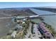 An aerial view showcases waterfront condos and waterways, highlighting the coastal setting at 134 Marsh View Villas, Folly Beach, SC 29439