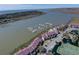 A scenic aerial shot of condos near a waterway and boat docks at 134 Marsh View Villas, Folly Beach, SC 29439