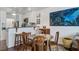 Inviting dining area adjacent to kitchen offers a comfortable space for meals and gatherings at 134 Marsh View Villas, Folly Beach, SC 29439