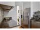 Bright kitchen features stainless steel appliances, granite countertops, and a convenient in-unit washer/dryer at 134 Marsh View Villas, Folly Beach, SC 29439