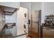 Bright kitchen features stainless steel appliances, granite countertops, and a convenient in-unit washer/dryer at 134 Marsh View Villas, Folly Beach, SC 29439