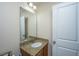 Well-lit bathroom featuring a granite countertop and neutral wall color at 138 Hidden Palms Blvd, Summerville, SC 29485
