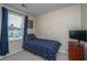 Functional bedroom features natural light, a television, and a storage dresser for a cozy and organized space at 138 Hidden Palms Blvd, Summerville, SC 29485