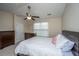 Bright bedroom with ceiling fan, two dressers, neutral walls, and a comfortable bed creating a serene atmosphere at 138 Hidden Palms Blvd, Summerville, SC 29485