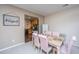 Charming dining area with seating for six and a view into the kitchen at 138 Hidden Palms Blvd, Summerville, SC 29485