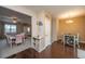 Cozy dining area with wood floors, coffee bar, and direct access to the adjacent living room and eating area at 138 Hidden Palms Blvd, Summerville, SC 29485