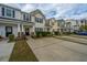 Well-maintained townhomes with manicured landscaping at 138 Hidden Palms Blvd, Summerville, SC 29485