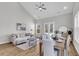 Modern open-concept living and dining space with a vaulted ceiling and plenty of natural light at 139 Cantona Dr, Summerville, SC 29483