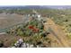 Scenic aerial view of marsh front home nestled among trees in coastal community at 1409 Dune Loft Villas, Seabrook Island, SC 29455