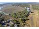 Expansive aerial view showcasing the waterfront property and winding marsh waterways at 1409 Dune Loft Villas, Seabrook Island, SC 29455