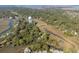 Bird's eye view of marsh-front community near the coast, featuring lush greenery and water views at 1409 Dune Loft Villas, Seabrook Island, SC 29455